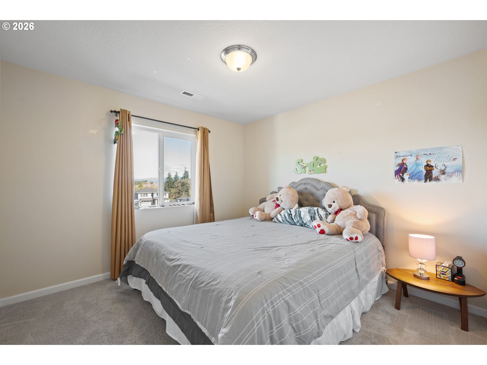 3676 North 10th Street Ridgefield, WA 98642 - Photo 30 of 37 a bedroom with a bed and a window