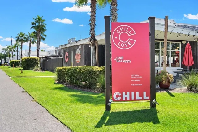 a view of a chairs and table in a patio