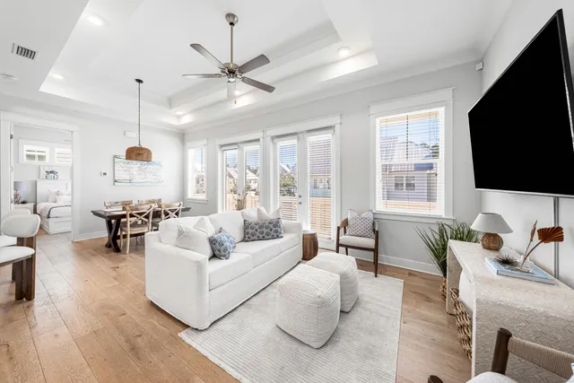 a living room with furniture fireplace and a flat screen tv