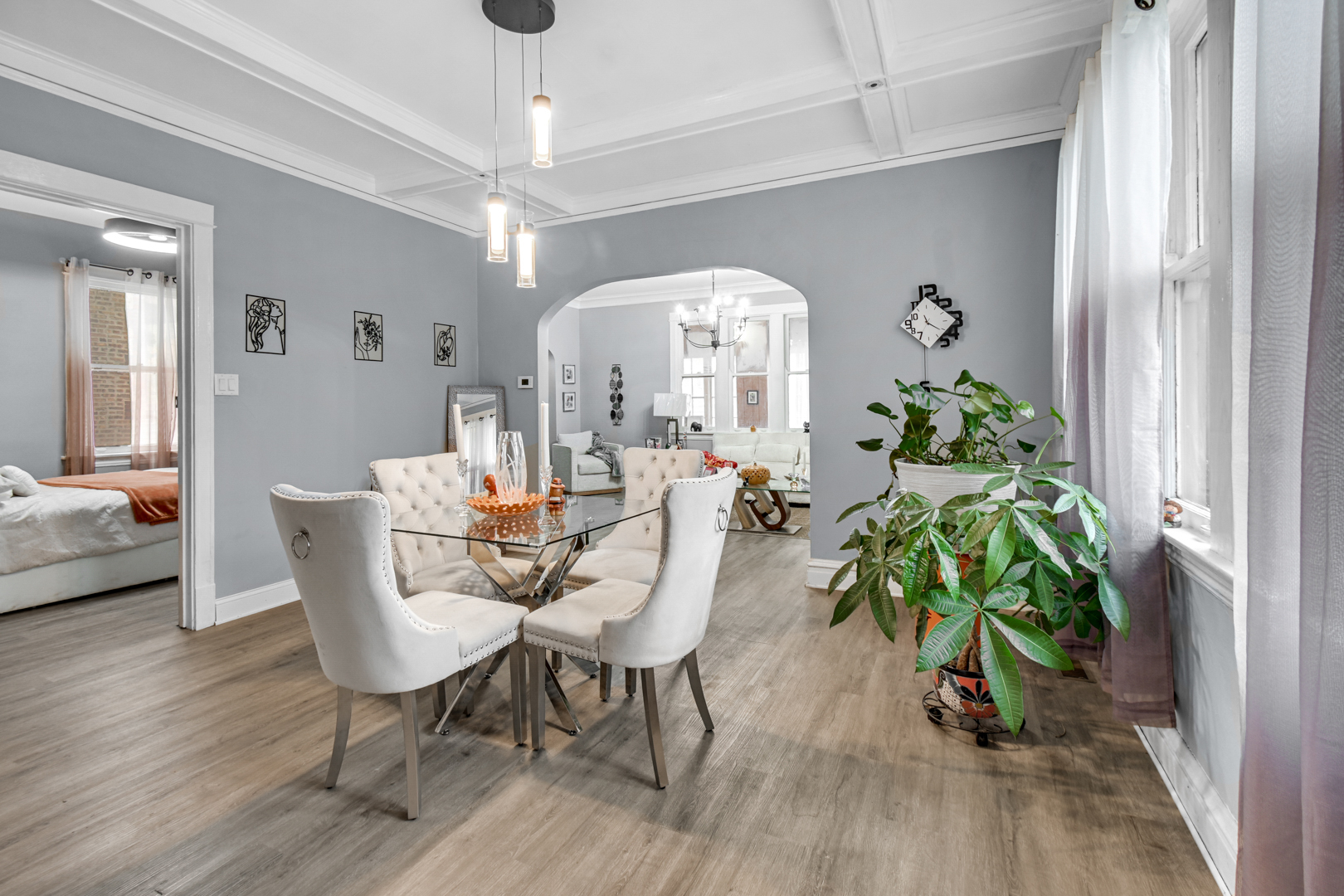 11548 South Normal Avenue Chicago, IL 60628 - Photo 12 of 21 a view of a dining room with furniture window and wooden floor