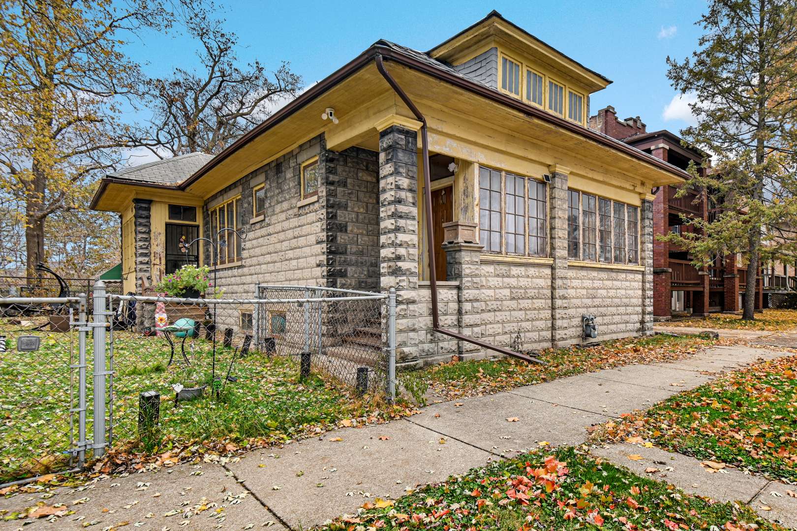 11548 South Normal Avenue Chicago, IL 60628 - Photo 3 of 21 a front view of a house with a yard