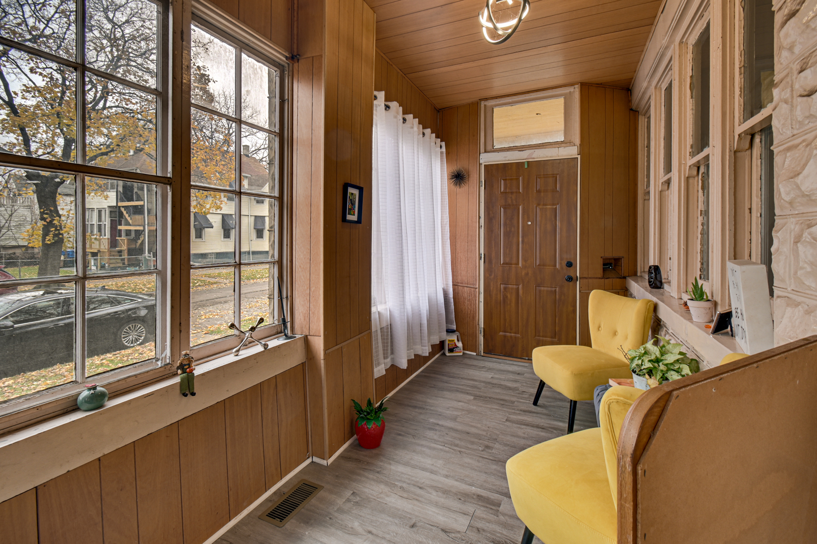 11548 South Normal Avenue Chicago, IL 60628 - Photo 7 of 21 a living room with furniture and a large window