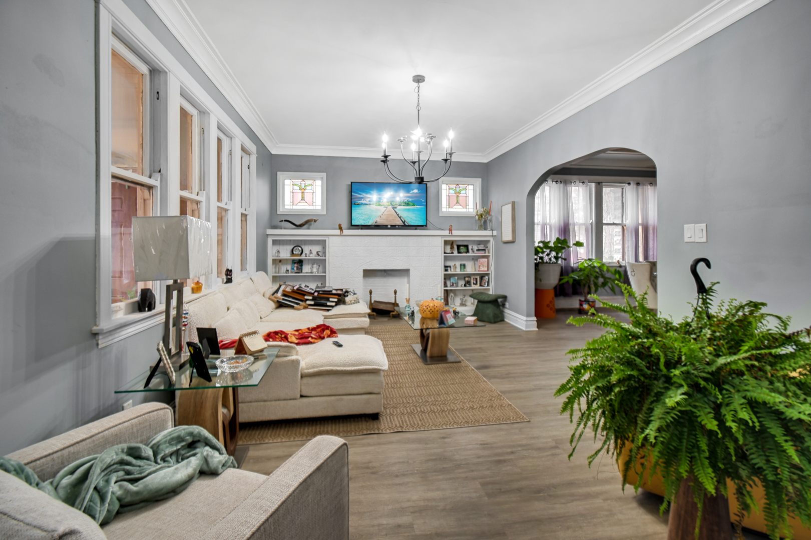 11548 South Normal Avenue Chicago, IL 60628 - Photo 8 of 21 a living room with furniture fireplace and a window