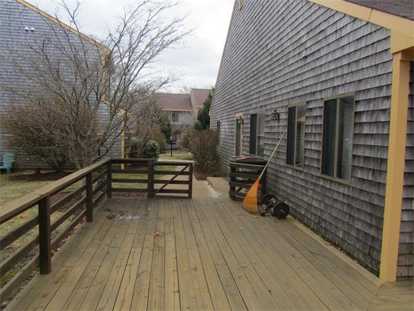 61 Round House Road, Unit 61 Bourne, MA 02532 - Photo 1 of 7 a view of outdoor seating in roof deck