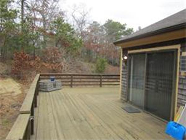 61 Round House Road, Unit 61 Bourne, MA 02532 - Photo 2 of 7 a view of entryway with wooden floor