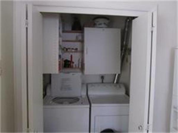 61 Round House Road, Unit 61 Bourne, MA 02532 - Photo 7 of 7 a close view of a utility room with washer and dryer