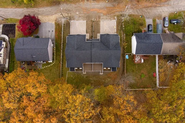 an aerial view of residential house with outdoor space