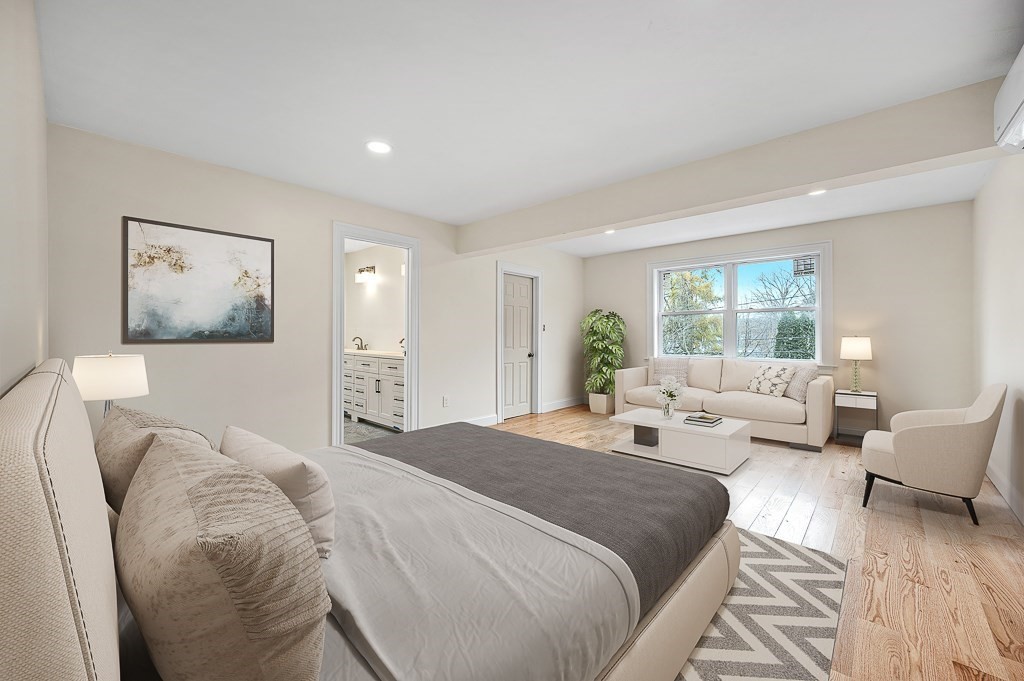 10 Beale Street Worcester, MA 01606 - Photo 4 of 42 a spacious bedroom with a bed and glass window