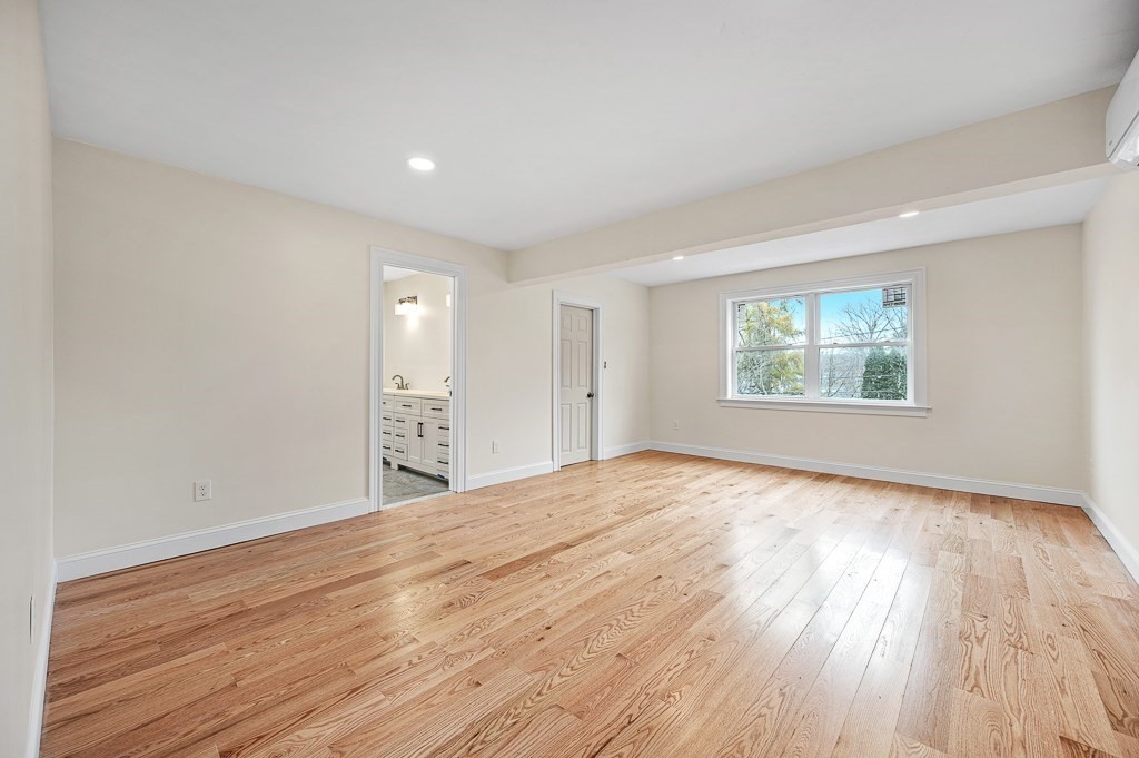 10 Beale Street Worcester, MA 01606 - Photo 42 of 42 a view of an empty room with wooden floor and a window
