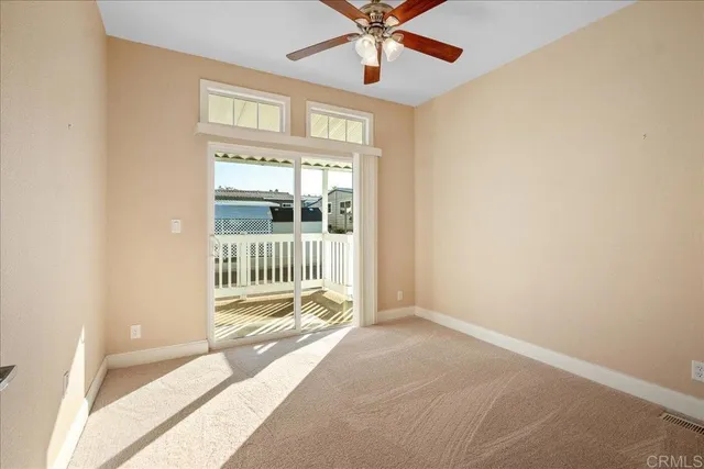 a bathroom with a sink toilet vanity and shower
