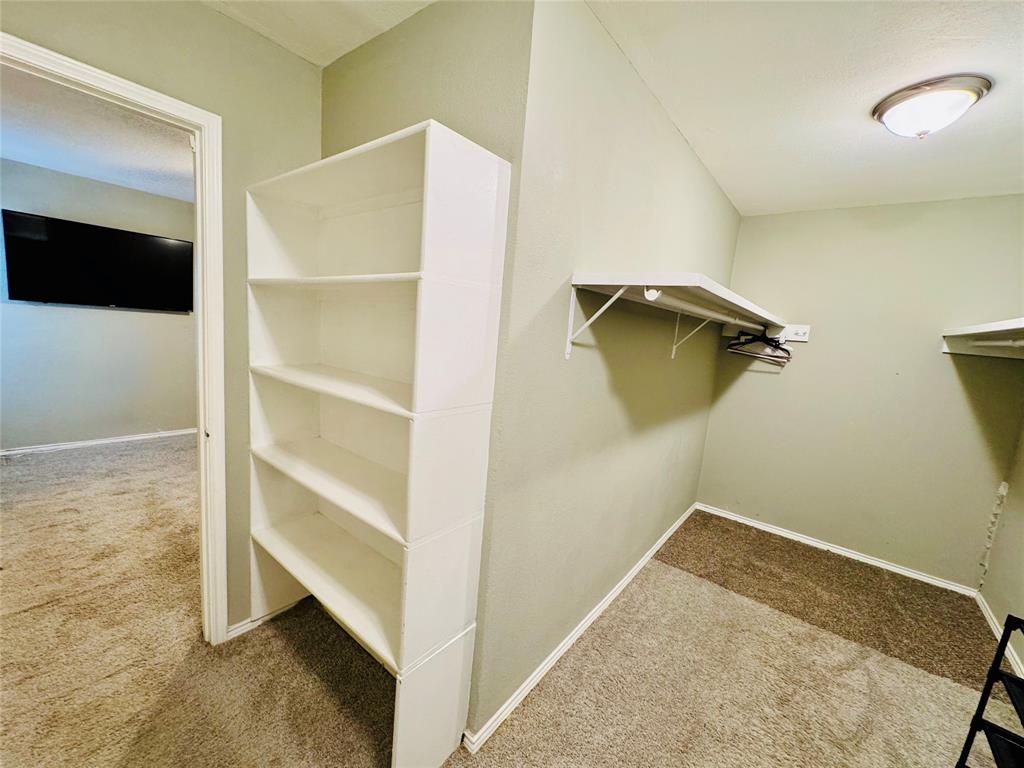 1712 Smokehouse Road Granbury, TX 76049 - Photo 22 of 25 Spacious walk-in closet with shelving