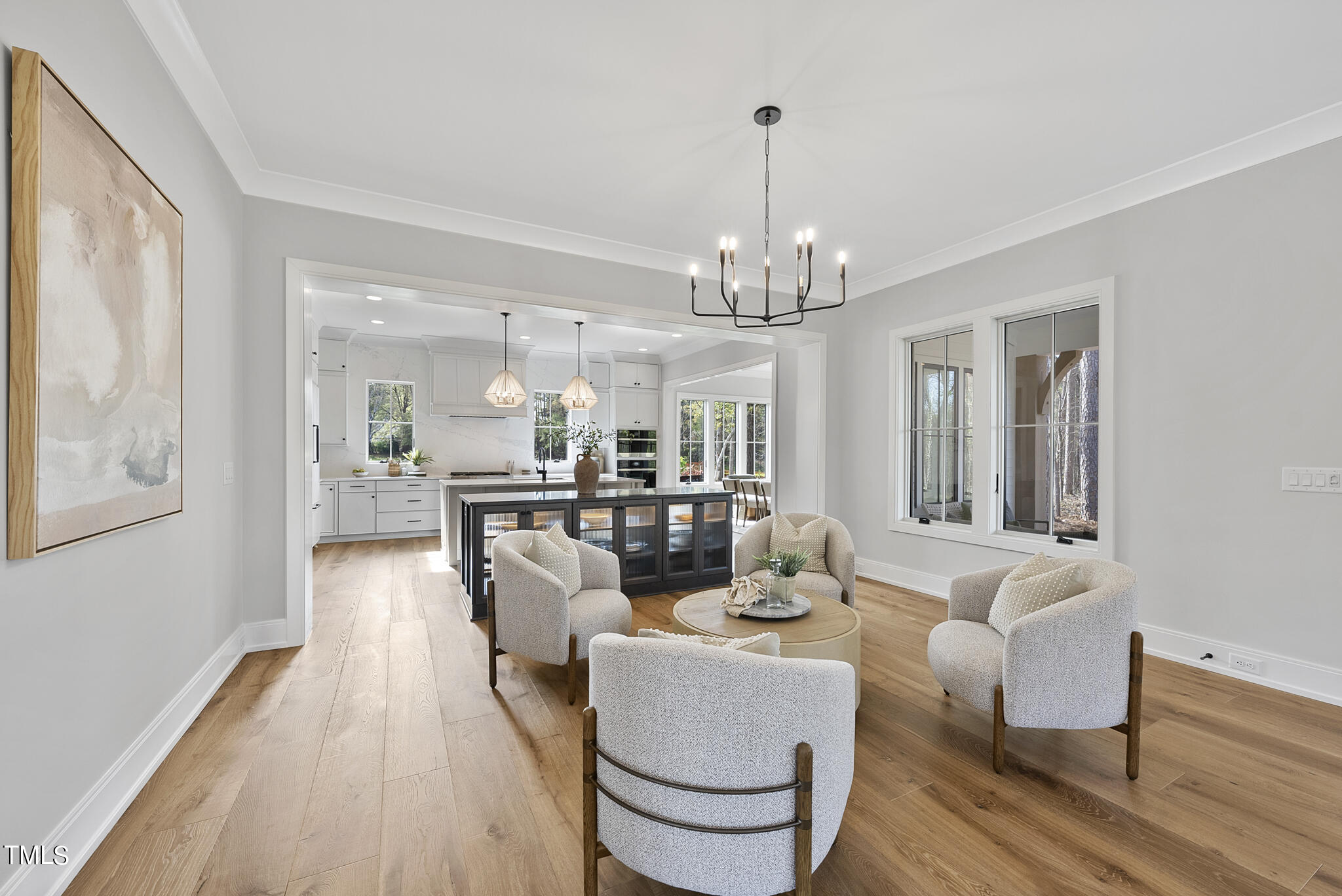 3409 Makers Circle Raleigh, NC 27612 - Photo 12 of 100 a living room with furniture and a chandelier