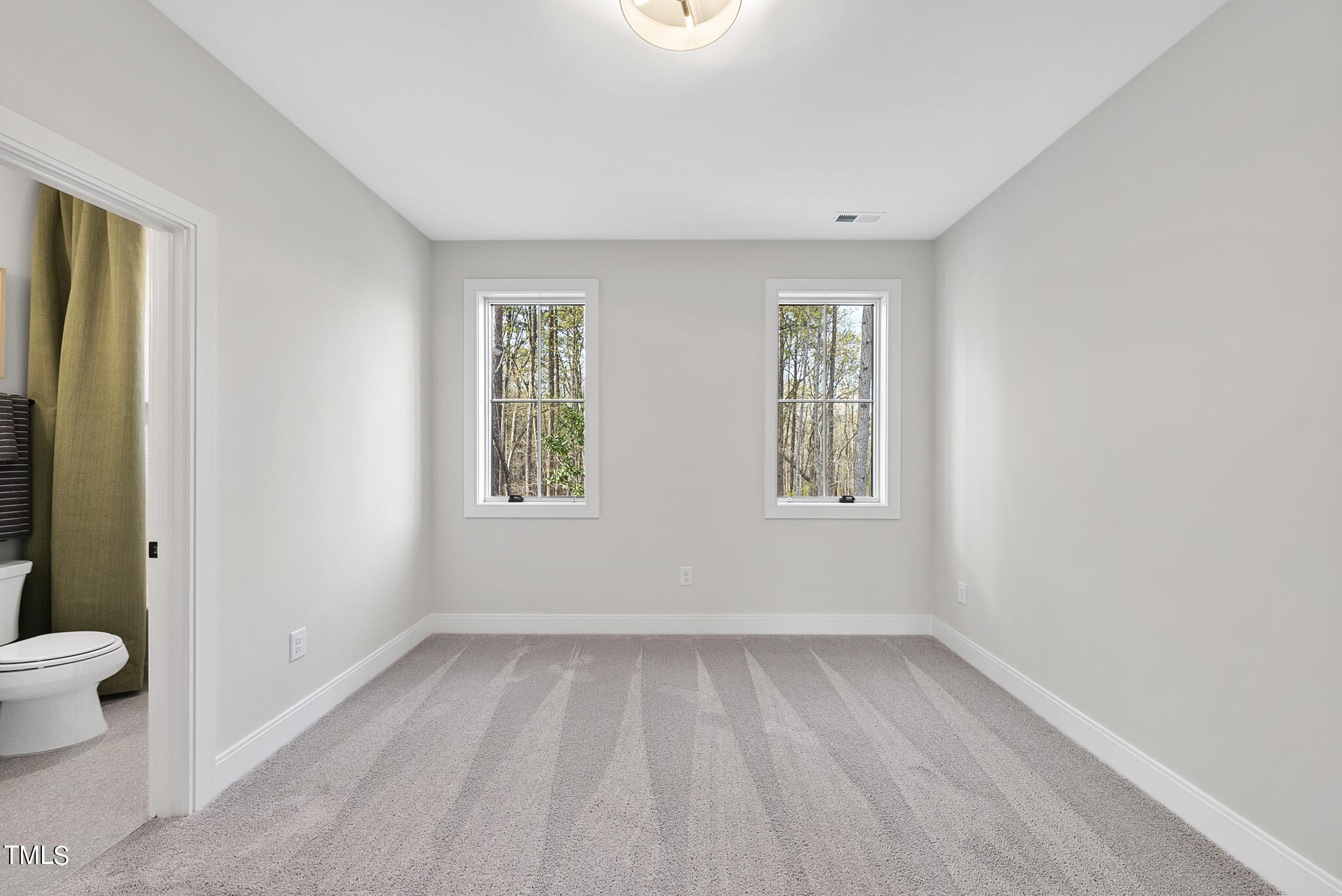 3409 Makers Circle Raleigh, NC 27612 - Photo 29 of 100 a view of room with window and hardwood floor