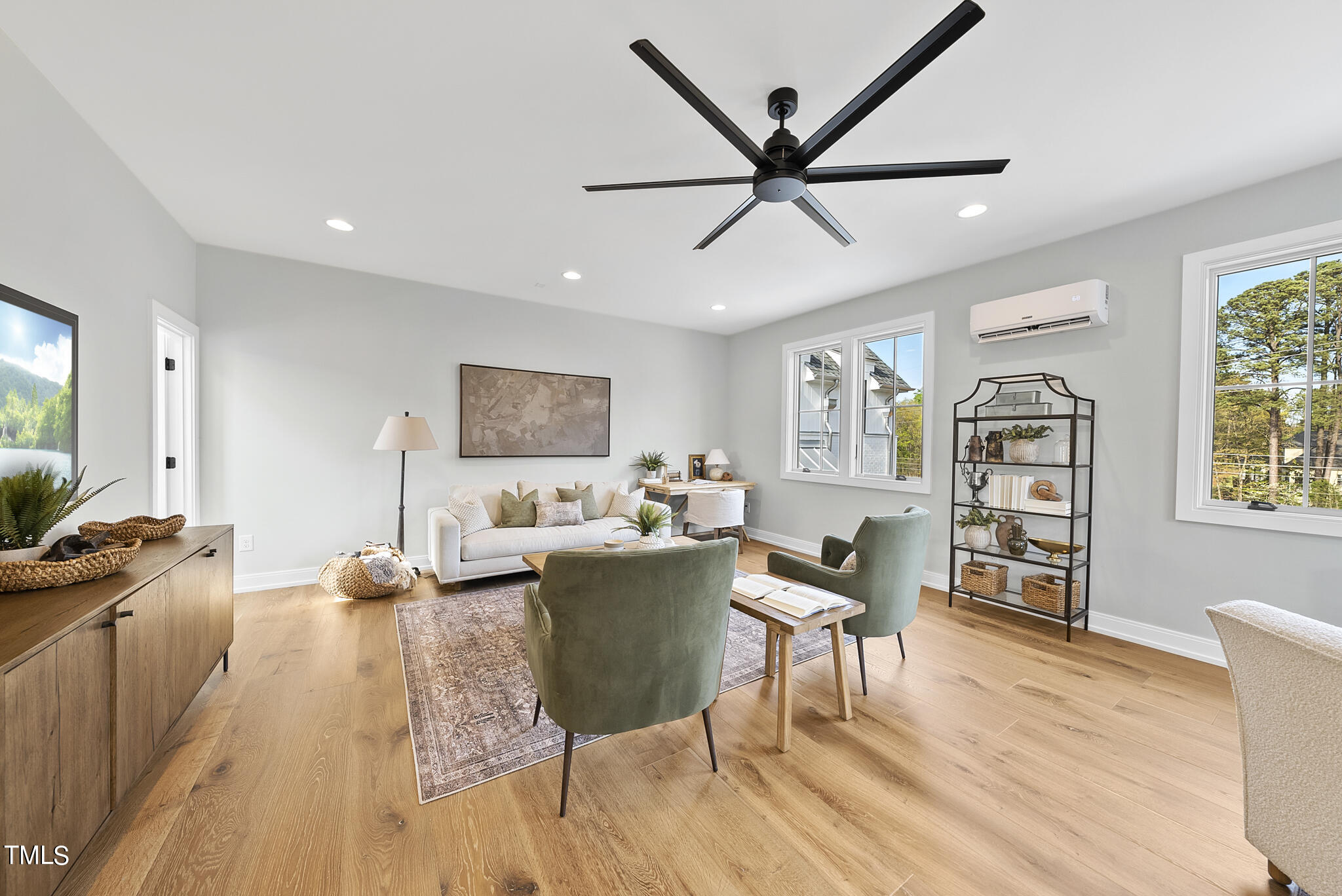 3409 Makers Circle Raleigh, NC 27612 - Photo 46 of 100 a living room with furniture and a wooden floor