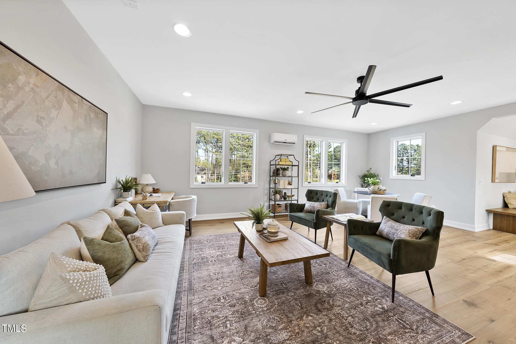 3409 Makers Circle Raleigh, NC 27612 - Photo 48 of 100 a living room with furniture a window and a potted plant