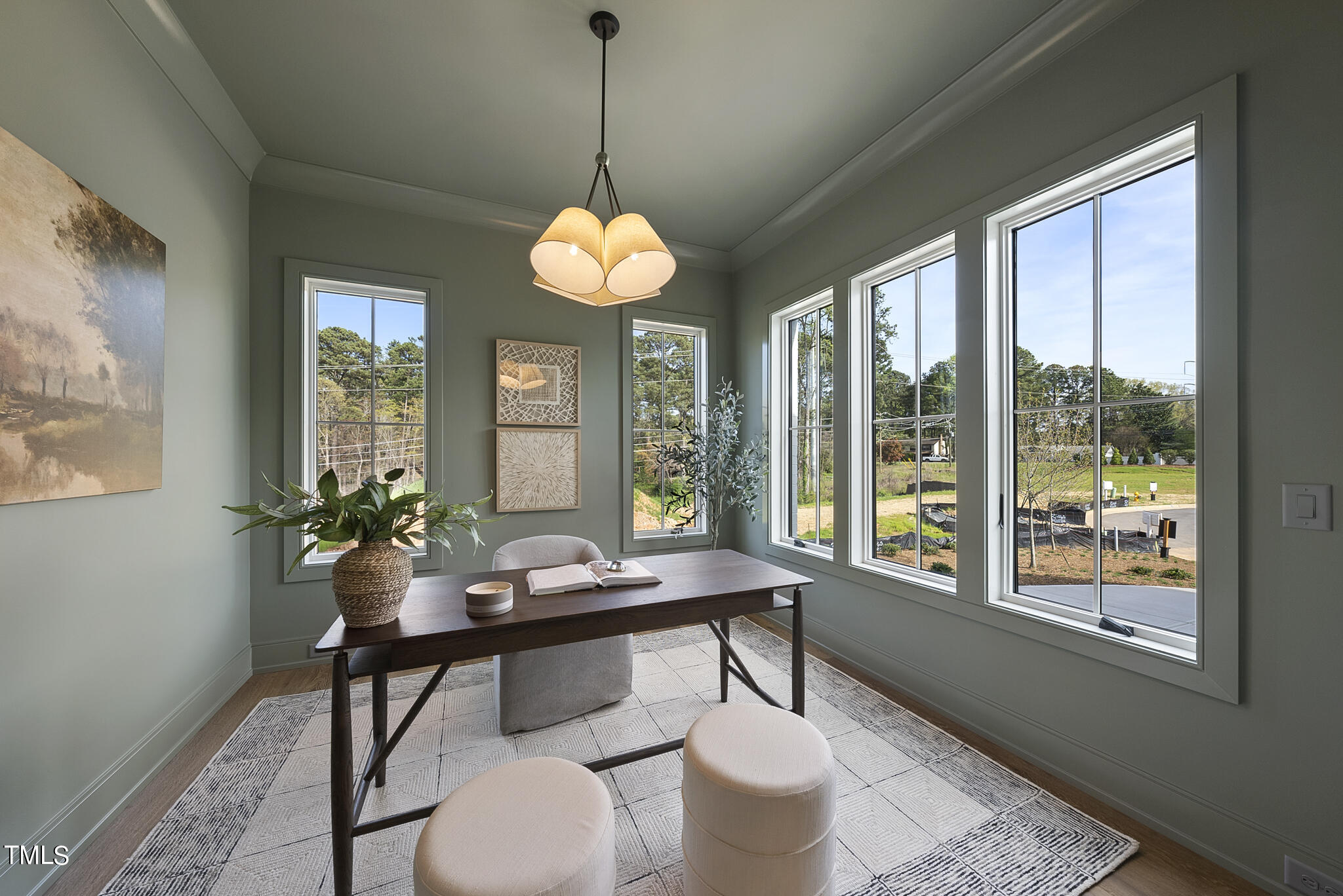 3409 Makers Circle Raleigh, NC 27612 - Photo 5 of 100 a room with furniture a chandelier and wooden floor