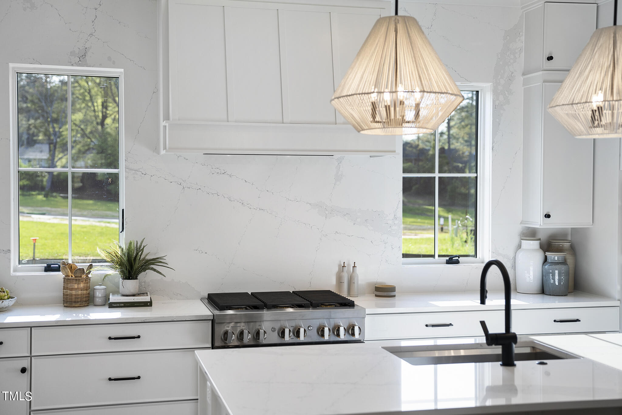 3409 Makers Circle Raleigh, NC 27612 - Photo 64 of 100 a kitchen with a sink a stove and cabinets