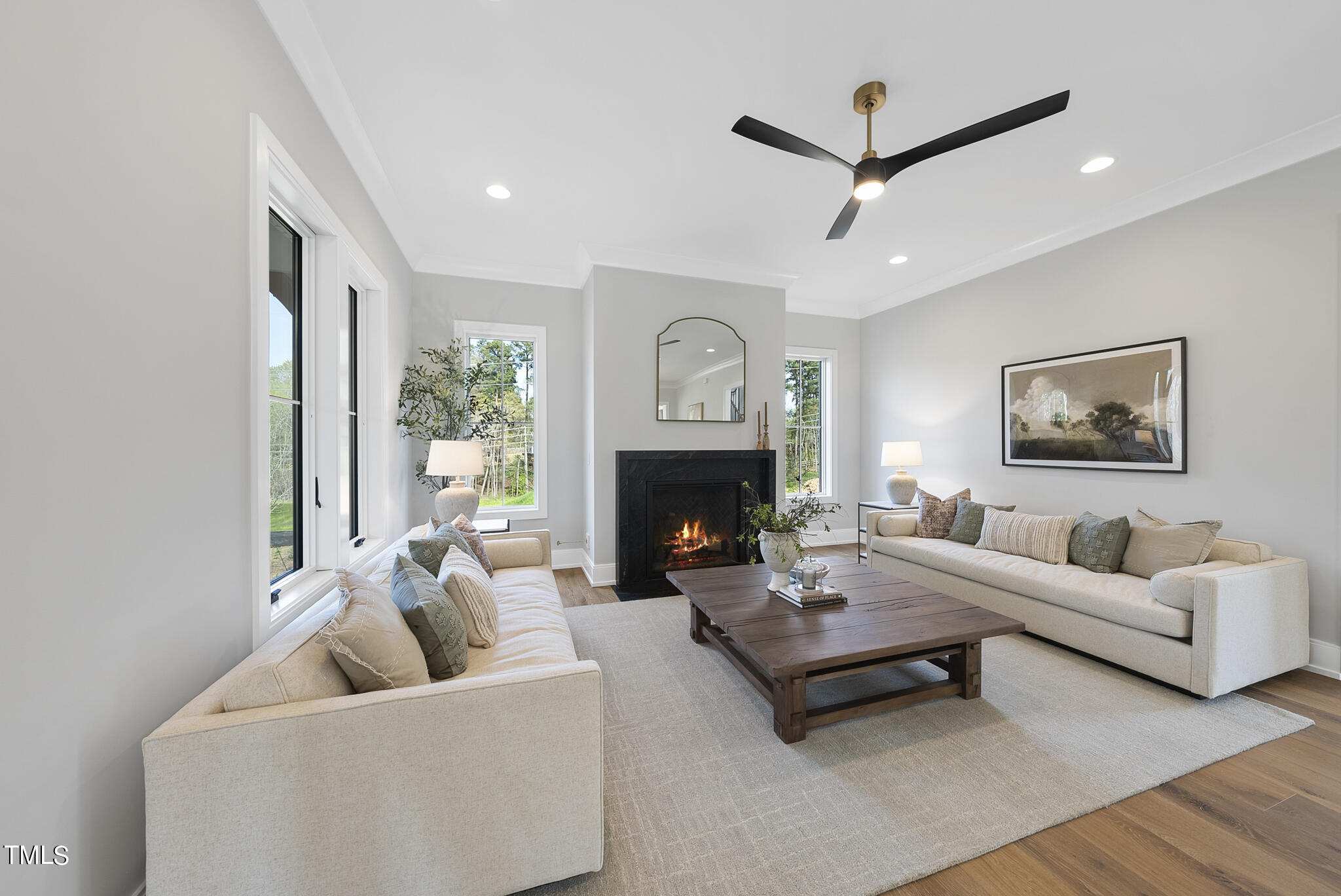 3409 Makers Circle Raleigh, NC 27612 - Photo 9 of 100 a living room with furniture and a fireplace