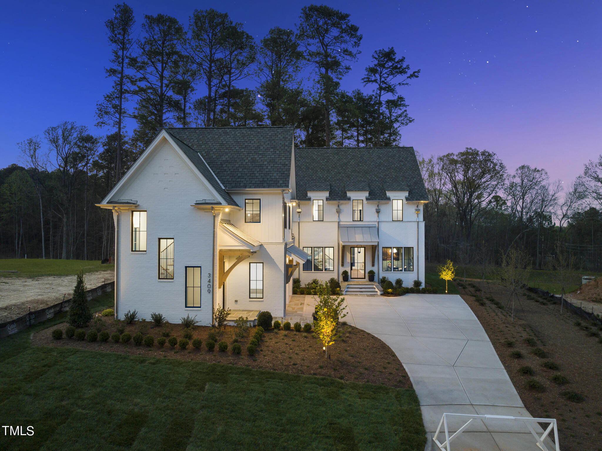 3409 Makers Circle Raleigh, NC 27612 - Photo 91 of 100 a front view of a house with a yard