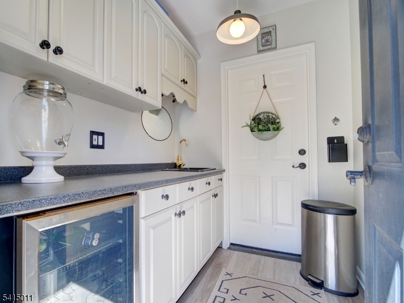 23 Ryerson Road Flemington, NJ 08822 - Photo 43 of 44 a bathroom with a sink and a mirror