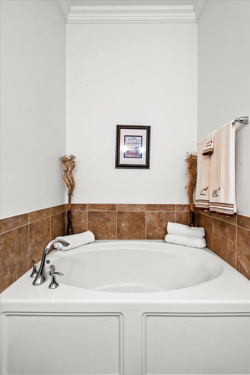 603 Dakota Drive Jupiter, FL 33458 - Photo 19 of 34 a bathroom with a sink and a mirror