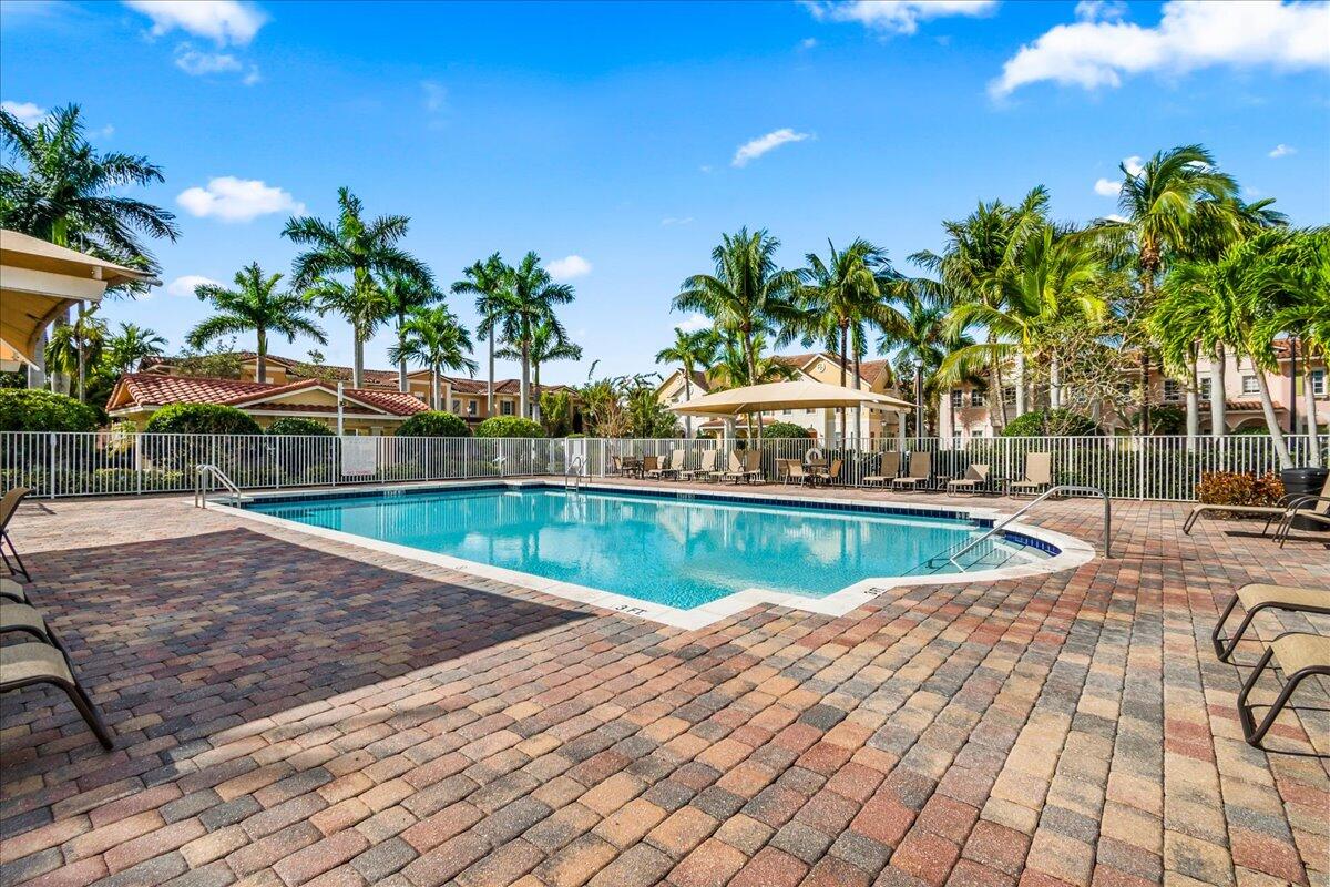 603 Dakota Drive Jupiter, FL 33458 - Photo 25 of 34 a view of swimming pool with a patio