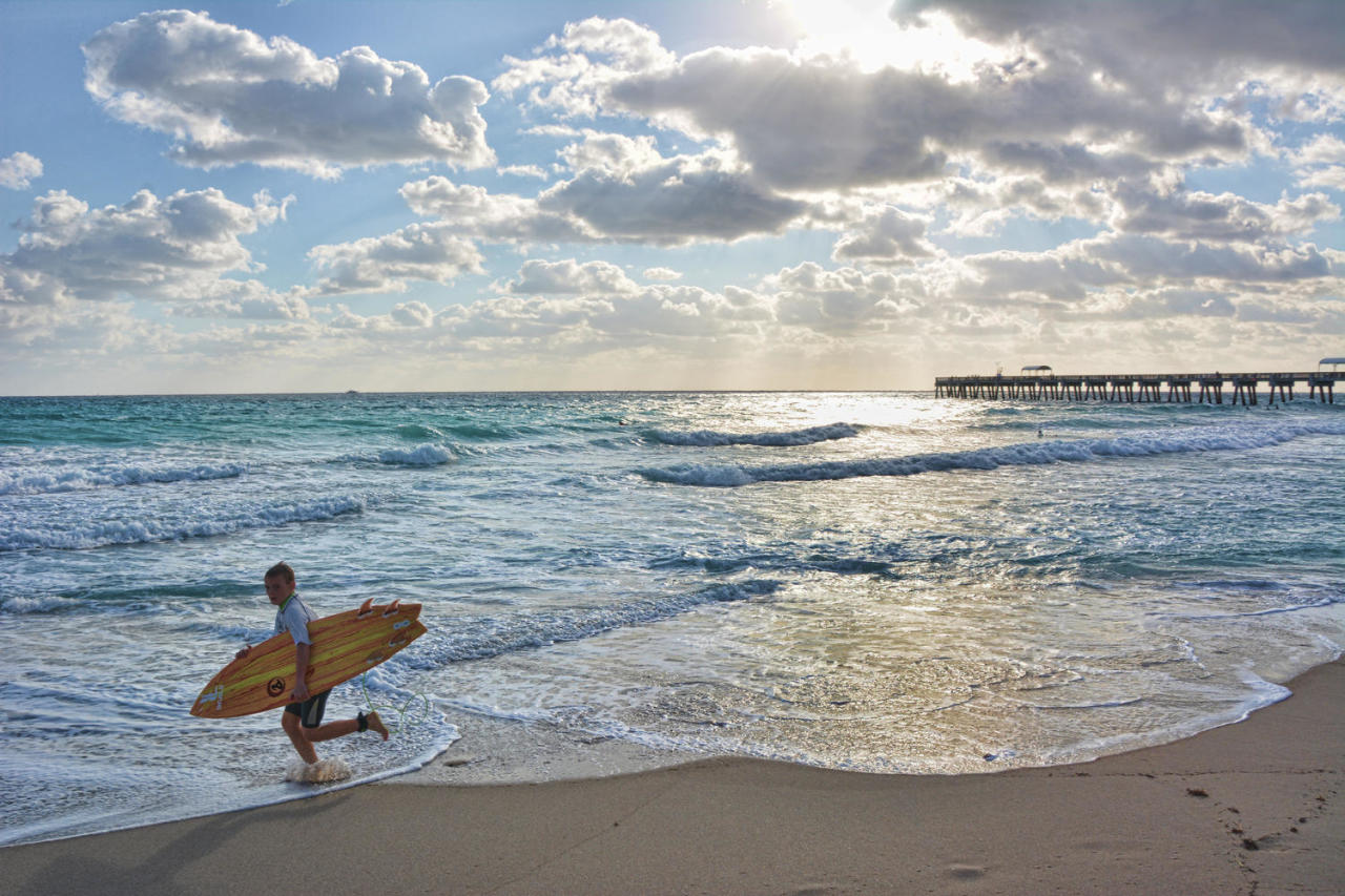 603 Dakota Drive Jupiter, FL 33458 - Photo 32 of 34 a view of ocean with beach