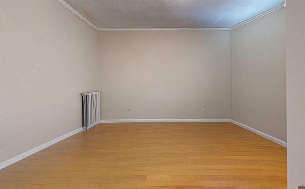5 Edgar Terrace, Unit 1 Somerville, MA 02145 - Photo 6 of 10 a view of an empty room