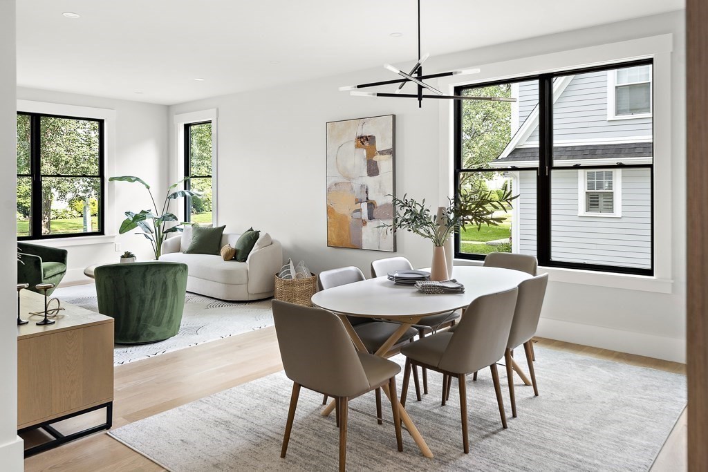 27 Coolidge Avenue Needham, MA 02492 - Photo 11 of 39 a view of a dining room with furniture window and outside view