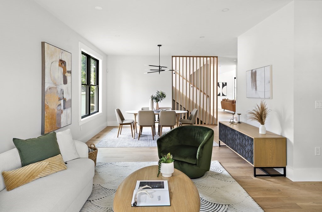 27 Coolidge Avenue Needham, MA 02492 - Photo 12 of 39 a living room with furniture and a large window