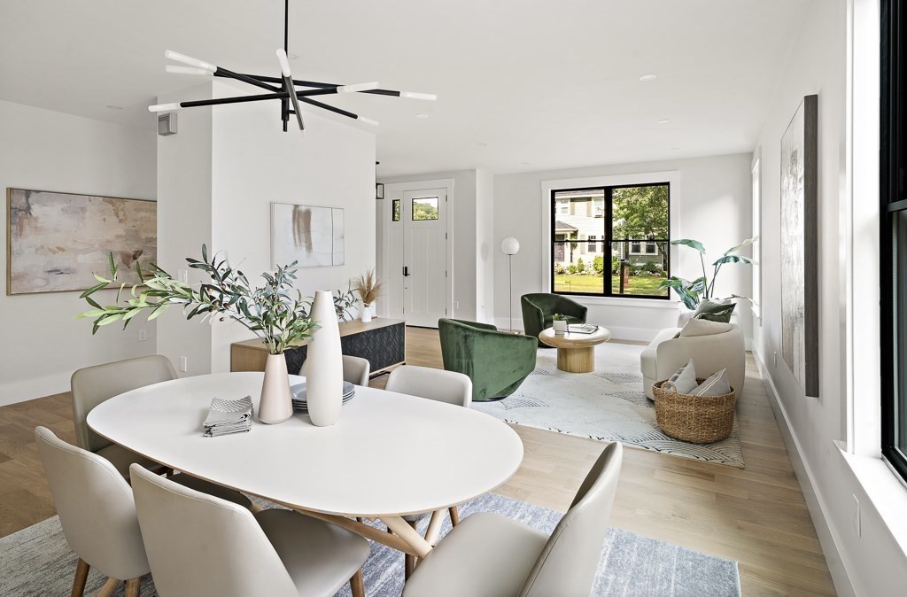 27 Coolidge Avenue Needham, MA 02492 - Photo 13 of 39 a living room with furniture and a potted plant