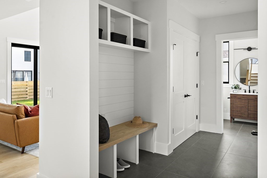 27 Coolidge Avenue Needham, MA 02492 - Photo 17 of 39 a view of a livingroom with furniture and windows