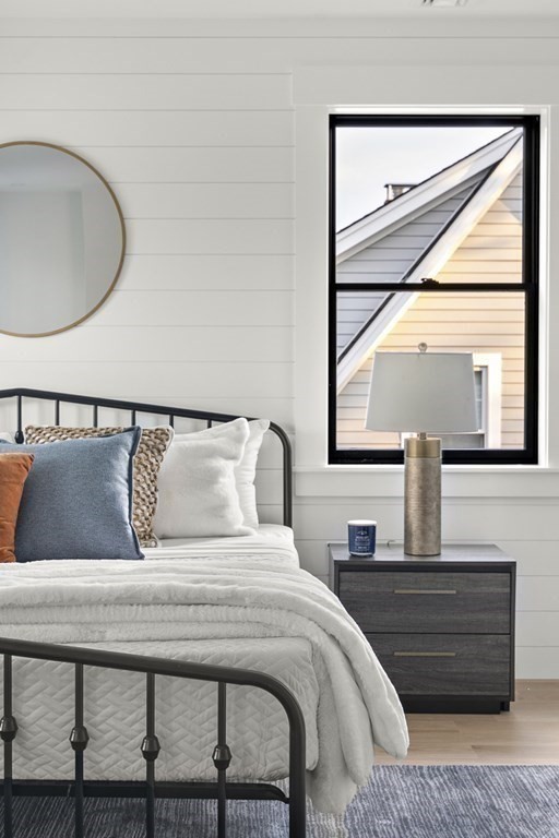 27 Coolidge Avenue Needham, MA 02492 - Photo 19 of 39 a bedroom with a bed and window