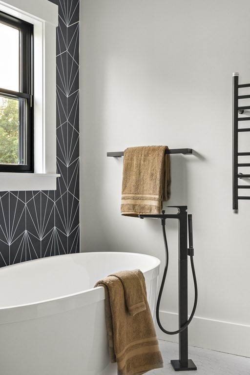 27 Coolidge Avenue Needham, MA 02492 - Photo 22 of 39 a bathroom with a bathtub and a shower