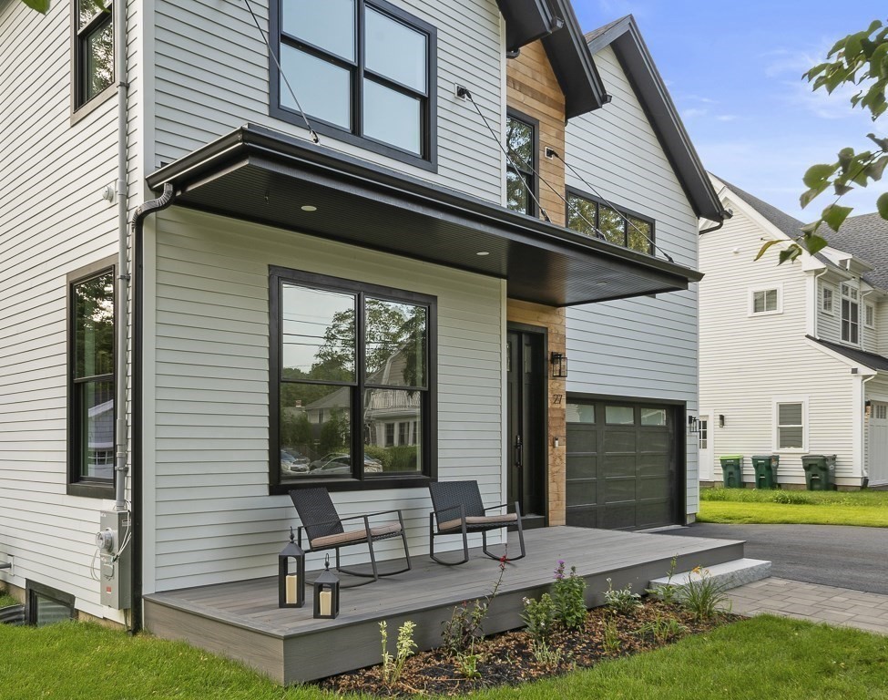 27 Coolidge Avenue Needham, MA 02492 - Photo 3 of 39 a view of a house with backyard and sitting area