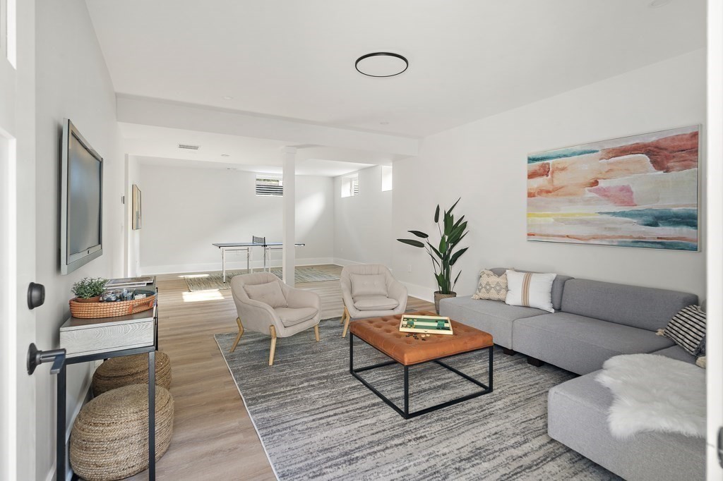 27 Coolidge Avenue Needham, MA 02492 - Photo 34 of 39 a living room with furniture and wooden floor