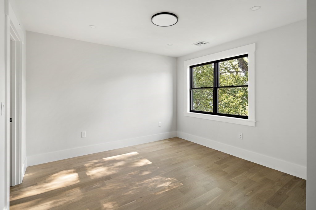 27 Coolidge Avenue Needham, MA 02492 - Photo 36 of 39 an empty room with windows