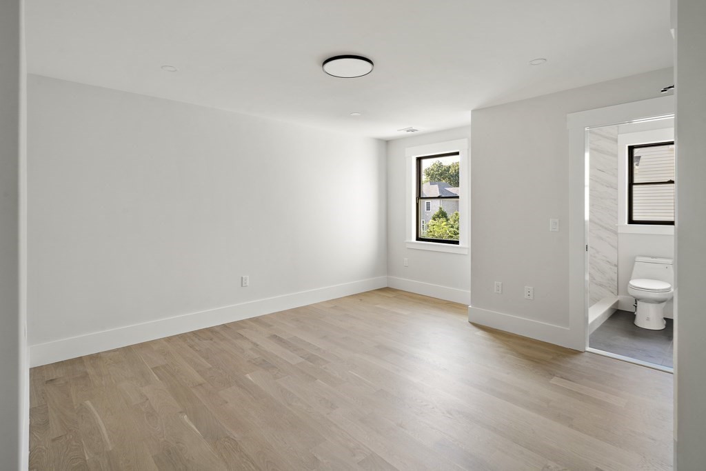 27 Coolidge Avenue Needham, MA 02492 - Photo 37 of 39 an empty room with windows and closet