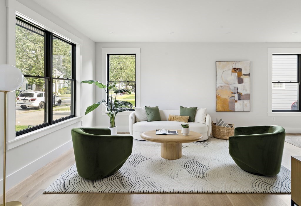 27 Coolidge Avenue Needham, MA 02492 - Photo 5 of 39 a living room with furniture a rug a window and a potted plant