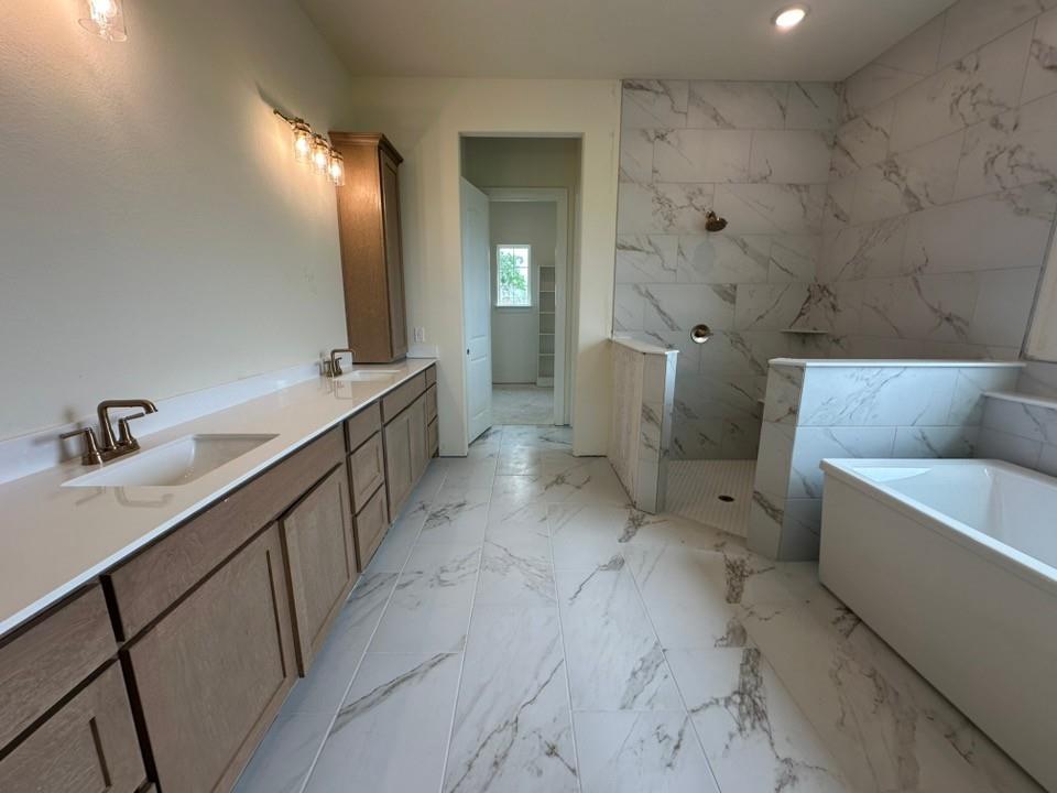 205 Cobb Road Leonard, TX 75452 - Photo 18 of 28 Spacious bathroom featuring a dual vanity with light wood-finish cabinetry and white countertops