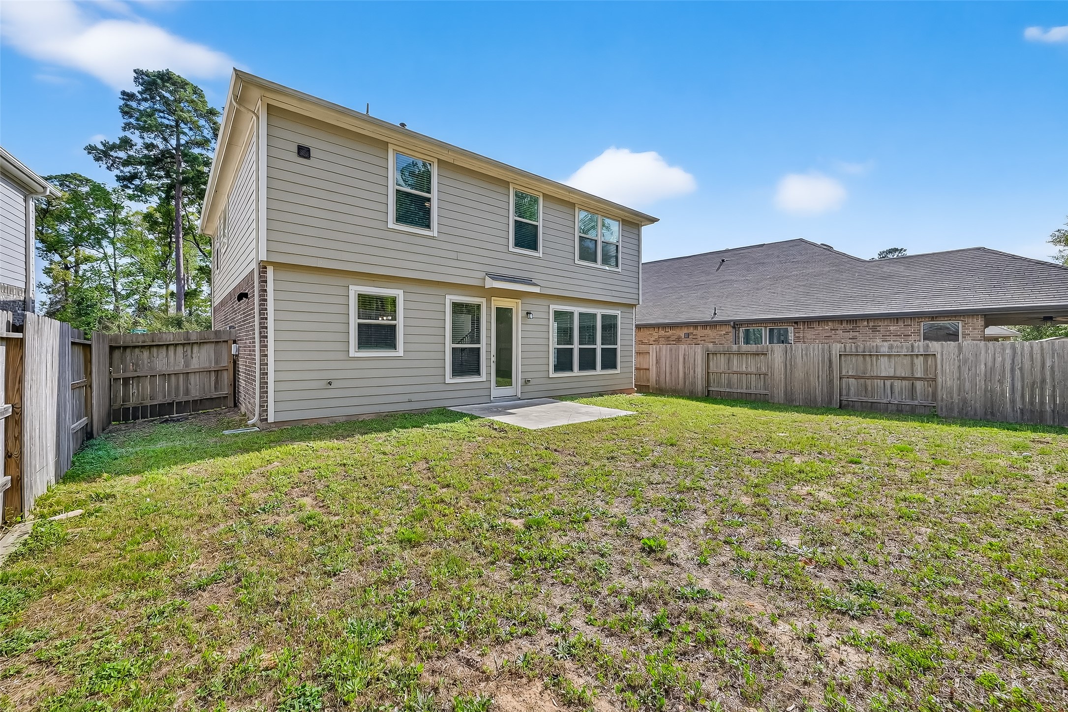 2107 Parnevik Place Conroe, TX 77304 - Photo 36 of 44 If you are soccer/futbol coach, you could hold practices back here!