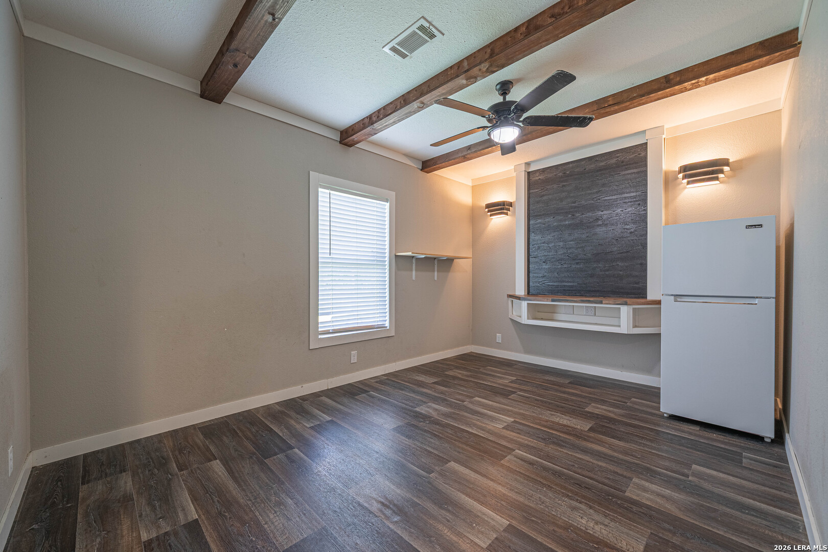 3433 Gander Slough Road Kingsbury, TX 78638 - Photo 17 of 23 a view of empty room with wooden floor and fan