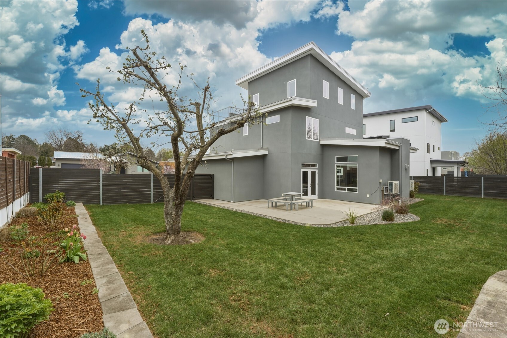 2130 Paramount Street Walla Walla, WA 99362 - Photo 34 of 40 a view of a house with backyard and a tree