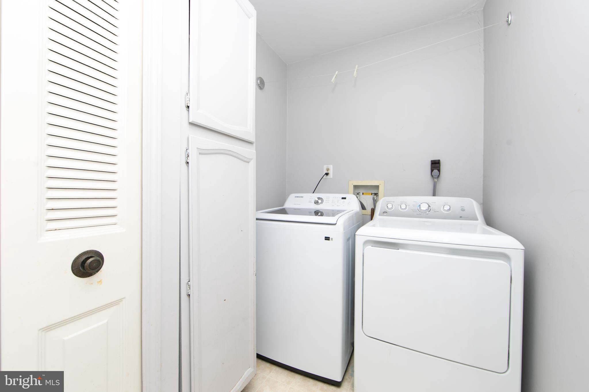 606 Kings Croft Drive Cherry Hill, NJ 08034 - Photo 32 of 35 a utility room with dryer and washer