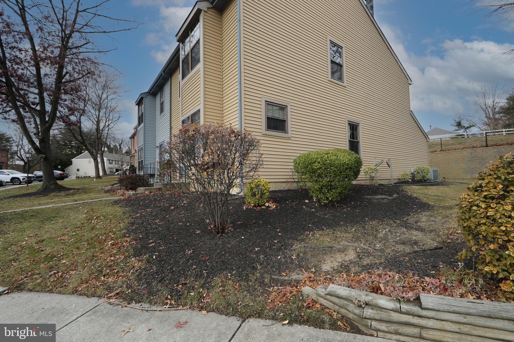 606 Kings Croft Drive Cherry Hill, NJ 08034 - Photo 35 of 35 a view of a backyard with plants and tree