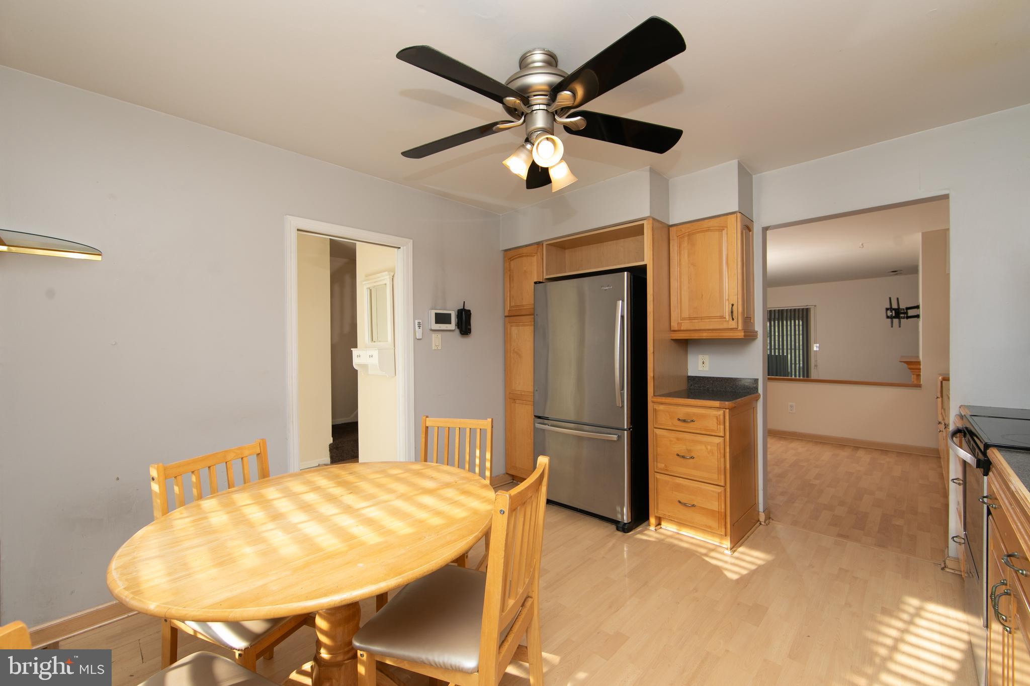 606 Kings Croft Drive Cherry Hill, NJ 08034 - Photo 5 of 35 a bed room with a bed and a chandelier