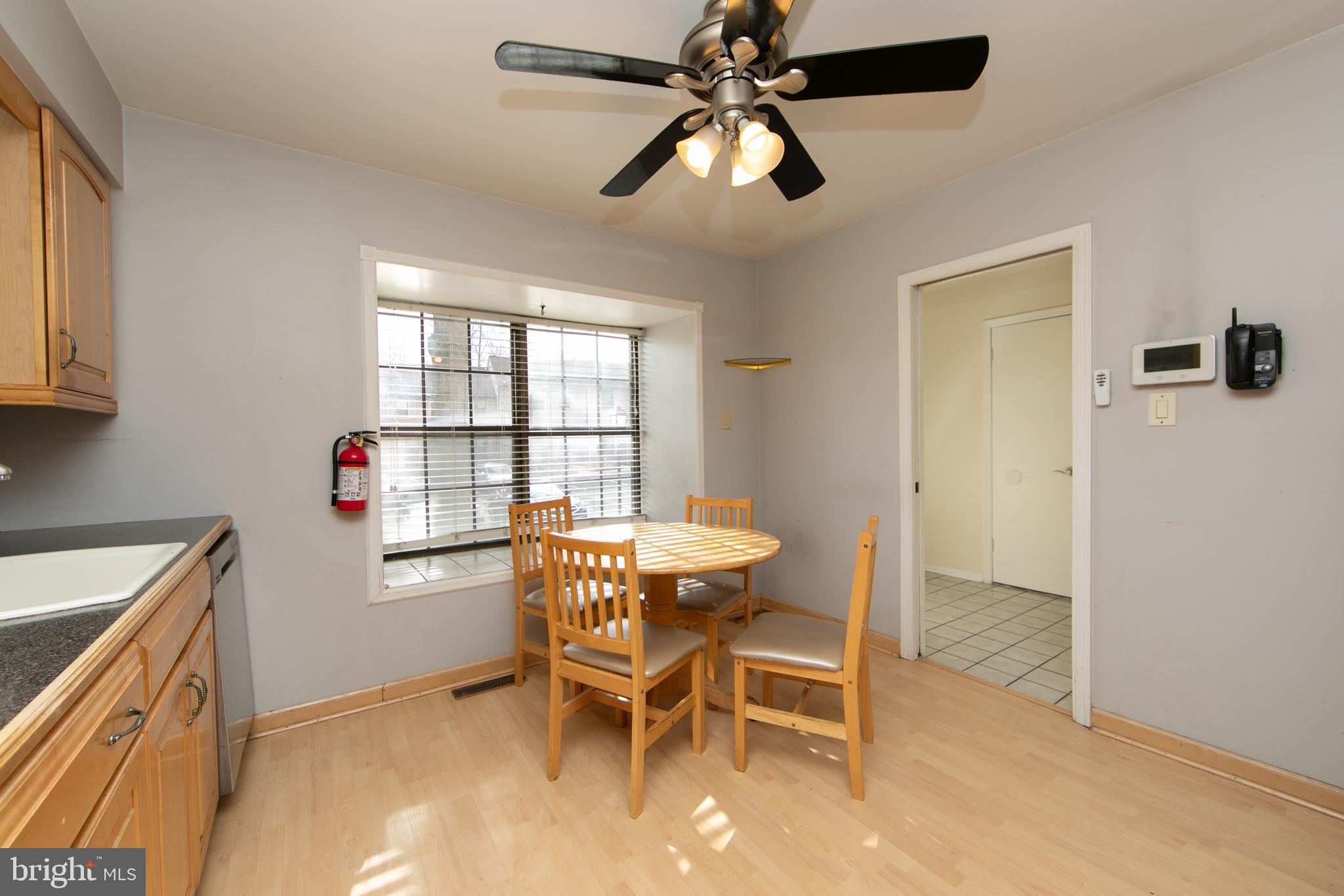 606 Kings Croft Drive Cherry Hill, NJ 08034 - Photo 6 of 35 a view of a dining room with furniture window and outside view