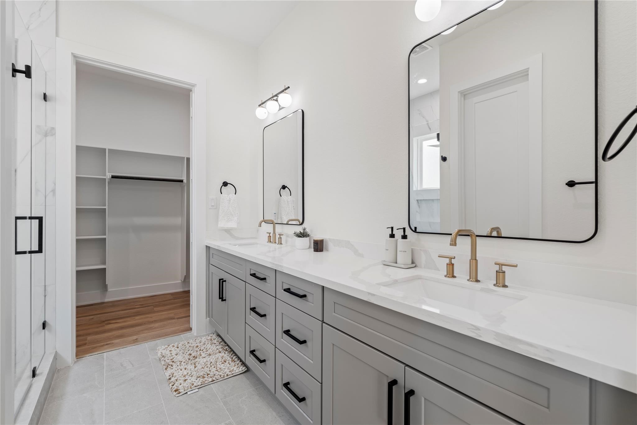 6532 Weston Street, Unit A Houston, TX 77021 - Photo 18 of 29 a bathroom with a double vanity sink mirror and double