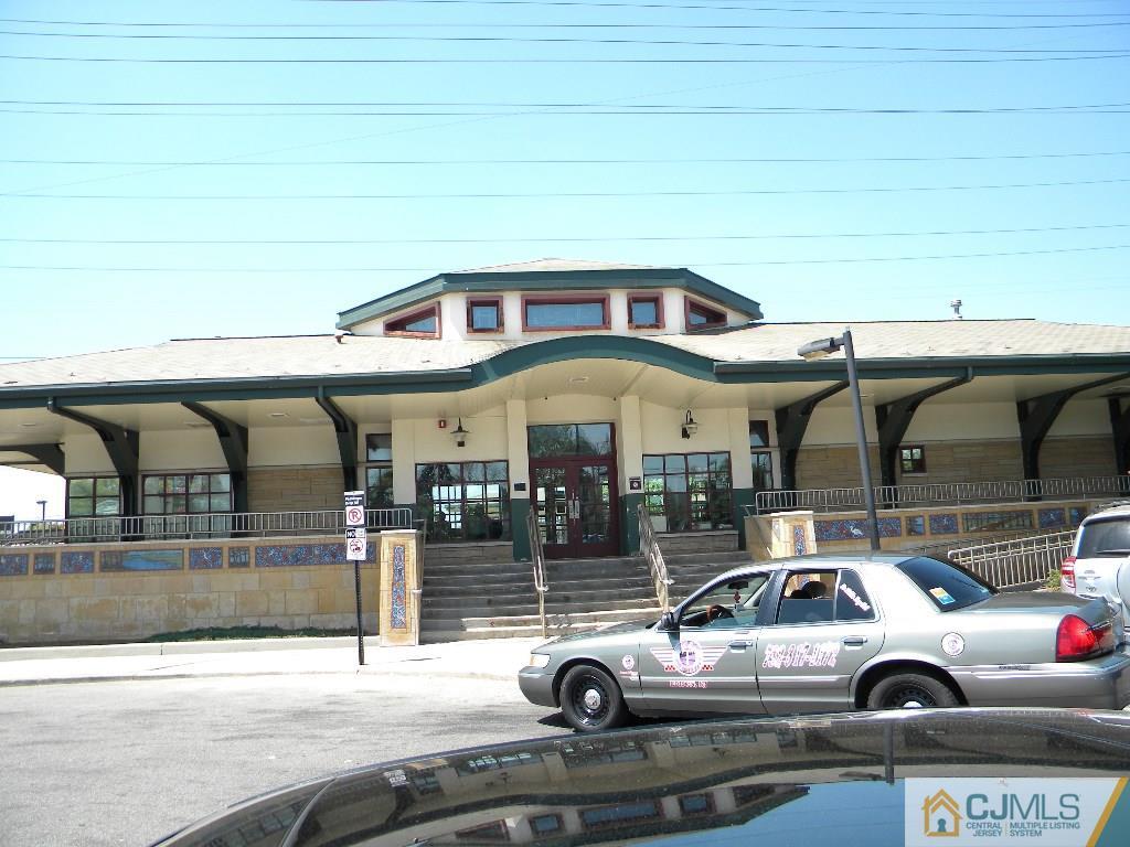 69 Eardley Road Edison, NJ 08817 - Photo 13 of 13 a car parked in front of a building