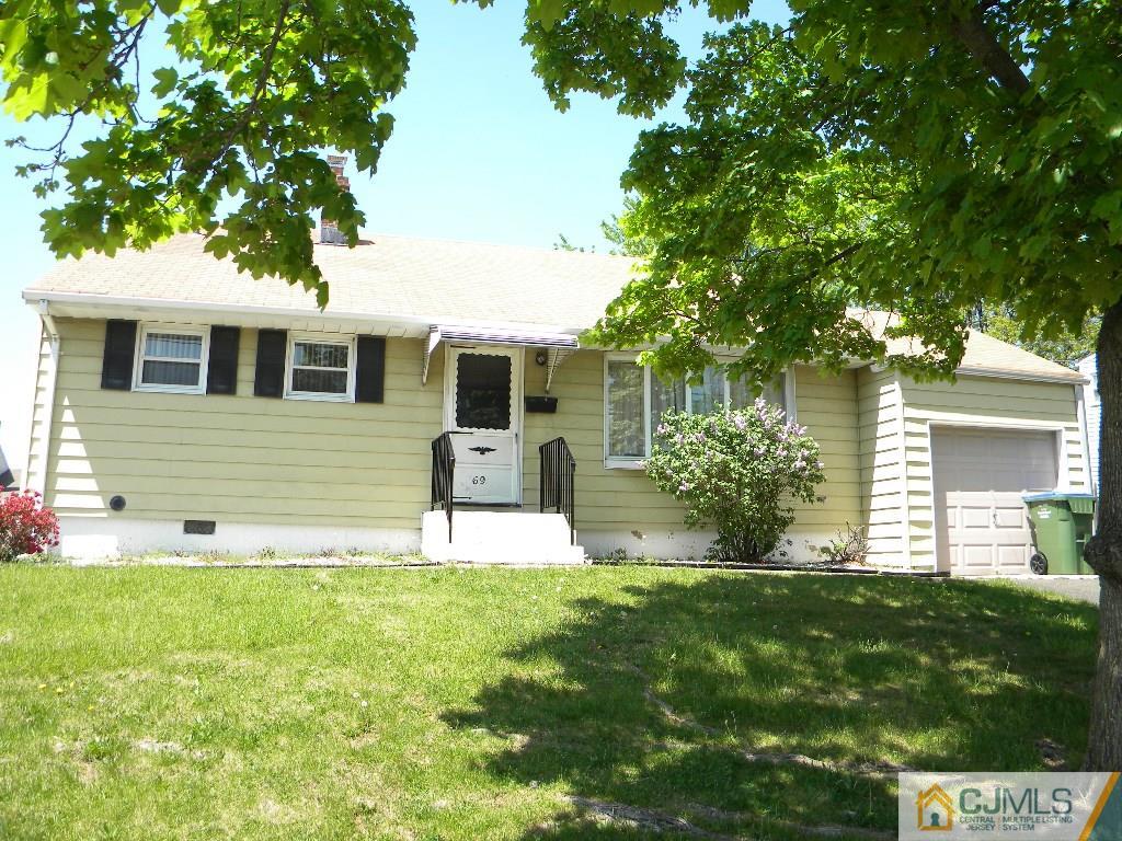 69 Eardley Road Edison, NJ 08817 - Photo 3 of 13 a view of a house with a yard